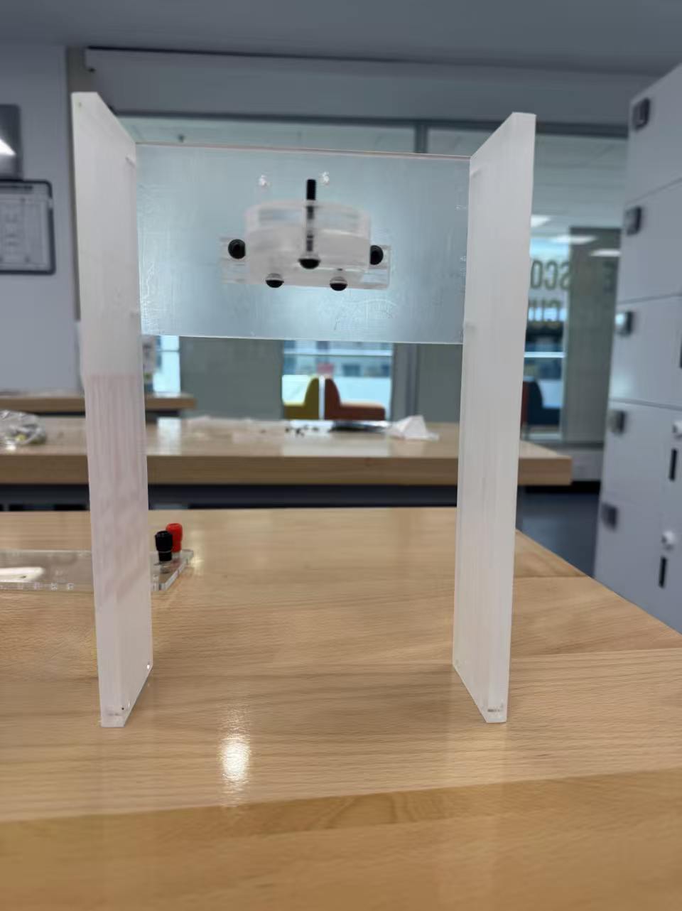 FIG.01 · Acrylic test frame with the electromagnet mount