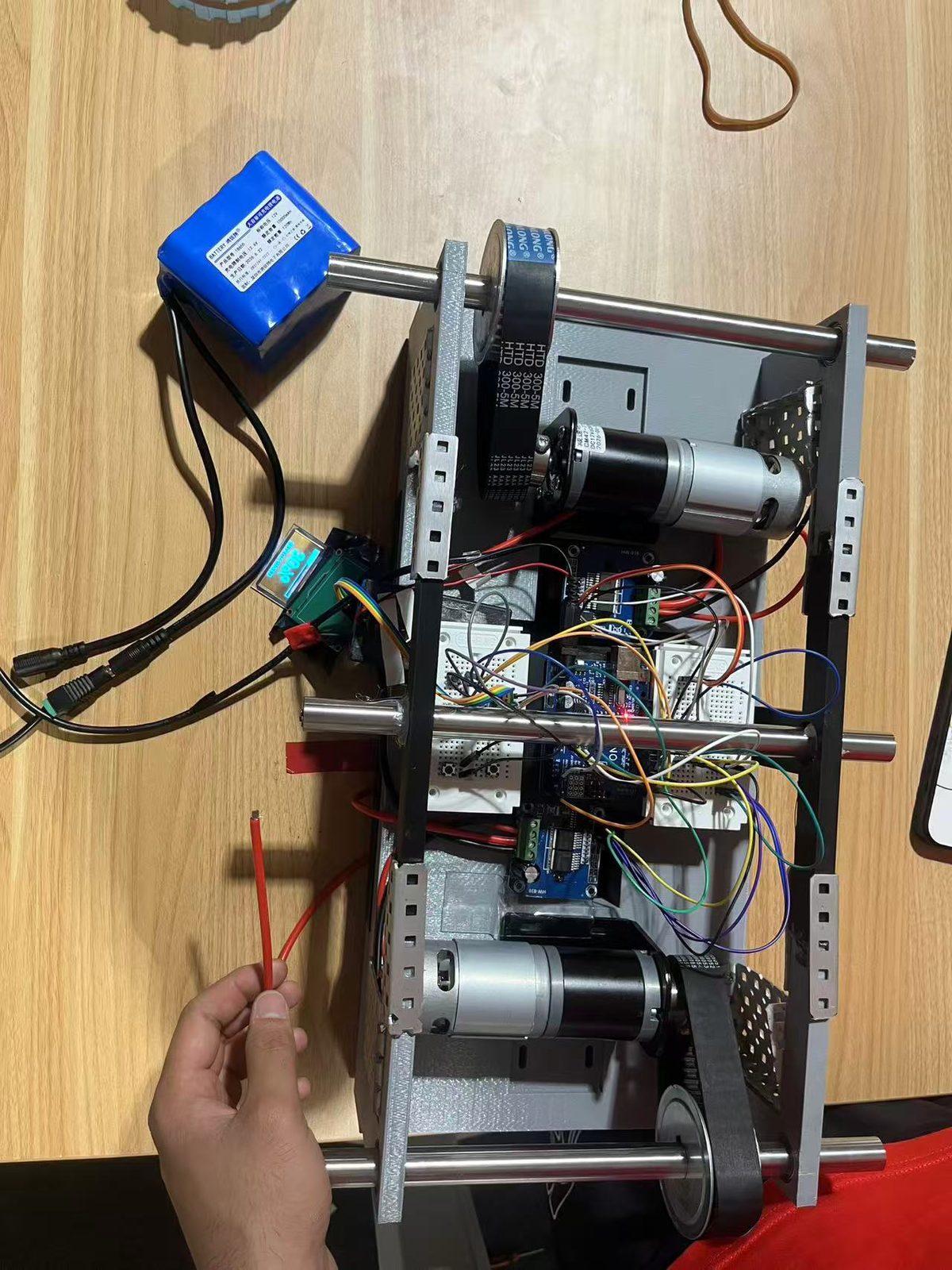 FIG.02 · Plan view with the belts, battery and control boards